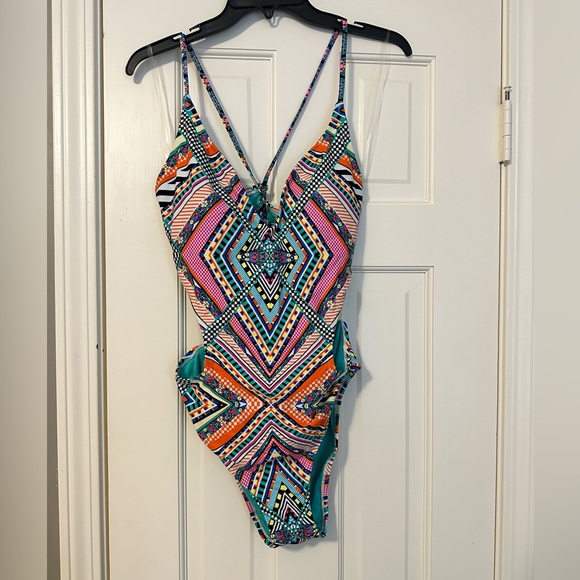 Jessica Simpson Swim One Piece Swimsuit With Side Cut Outs And Open